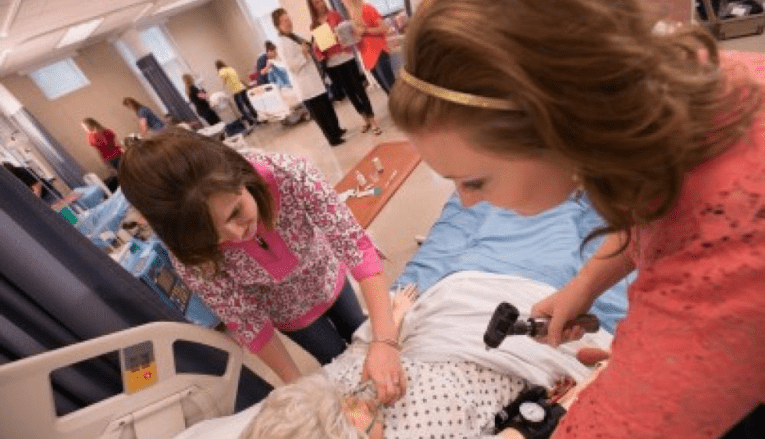 Students working in nursing lab