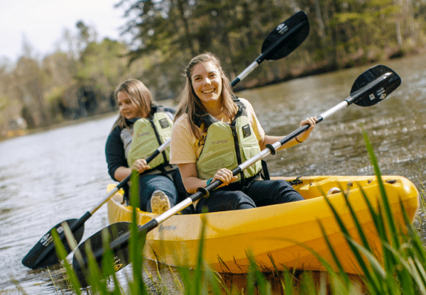 two women canoeing