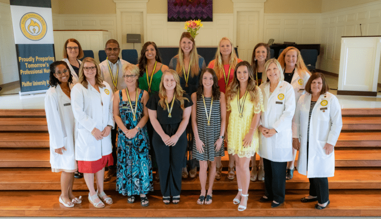 Group of nursing students with awards