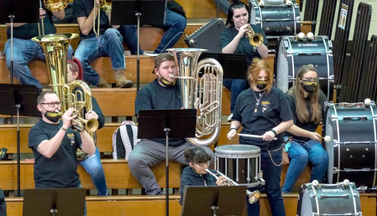 Pep Band playing on bleachers