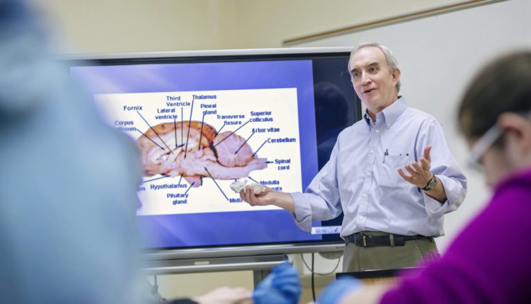 Biology professor teaching class