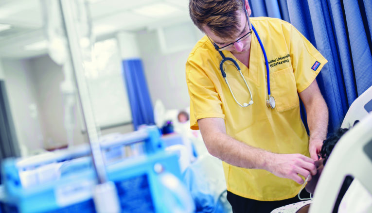 Student working in nursing lab