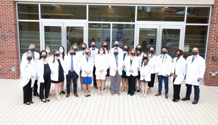 Group of students in white coat